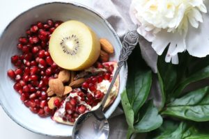 plate with different kinds of fruits and nuts