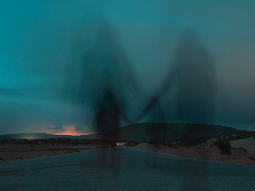 shadows of haunting couple fading away