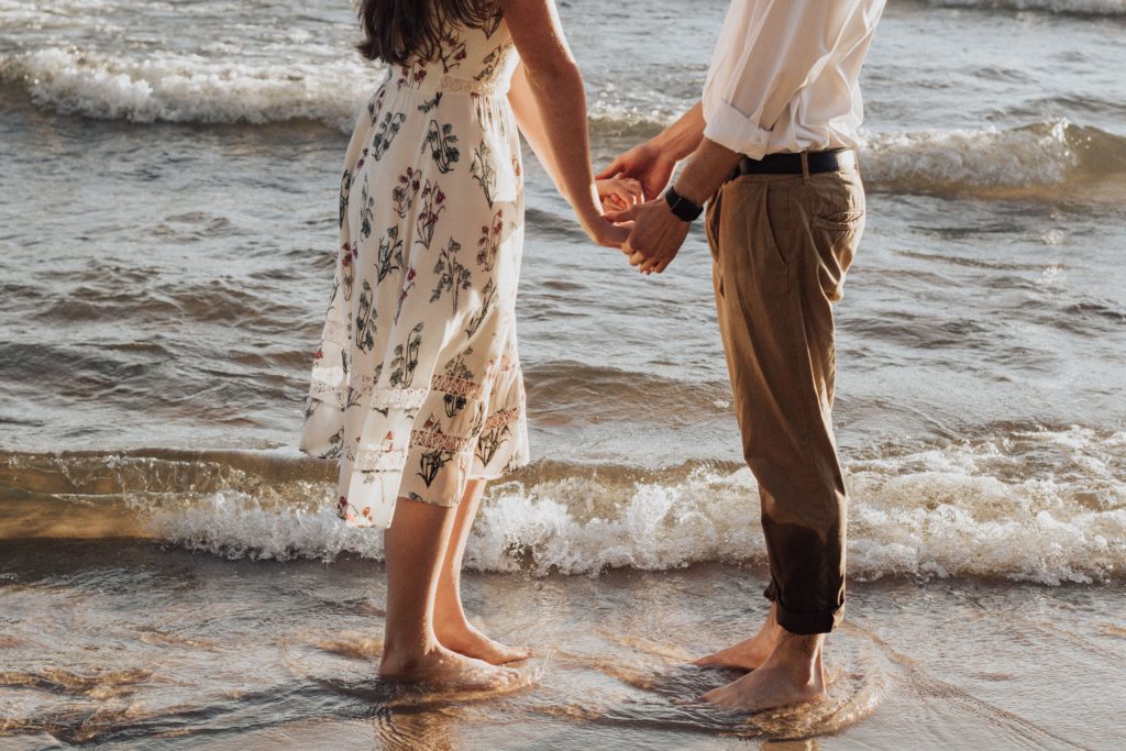 couple meeting at beach after deciding not to compromise