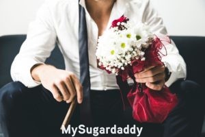 guy in suit representing one of the worst types of sugar daddy, the one that wants to marry you