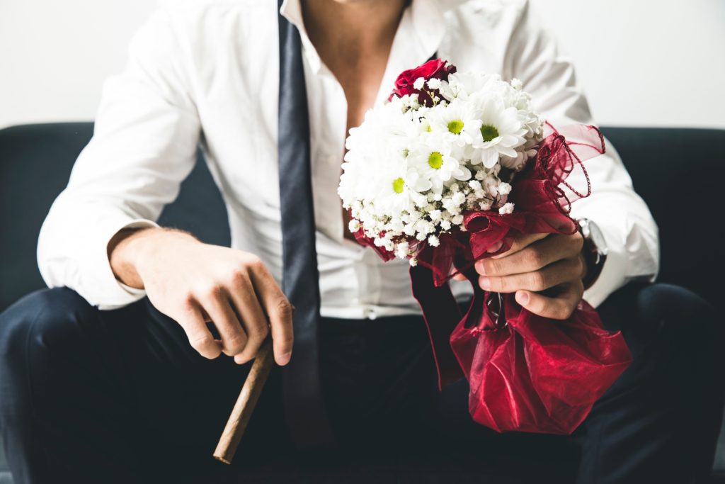 guy in suit representing one of the worst types of sugar daddy, the one that wants to marry you even though you said you didn't want romance