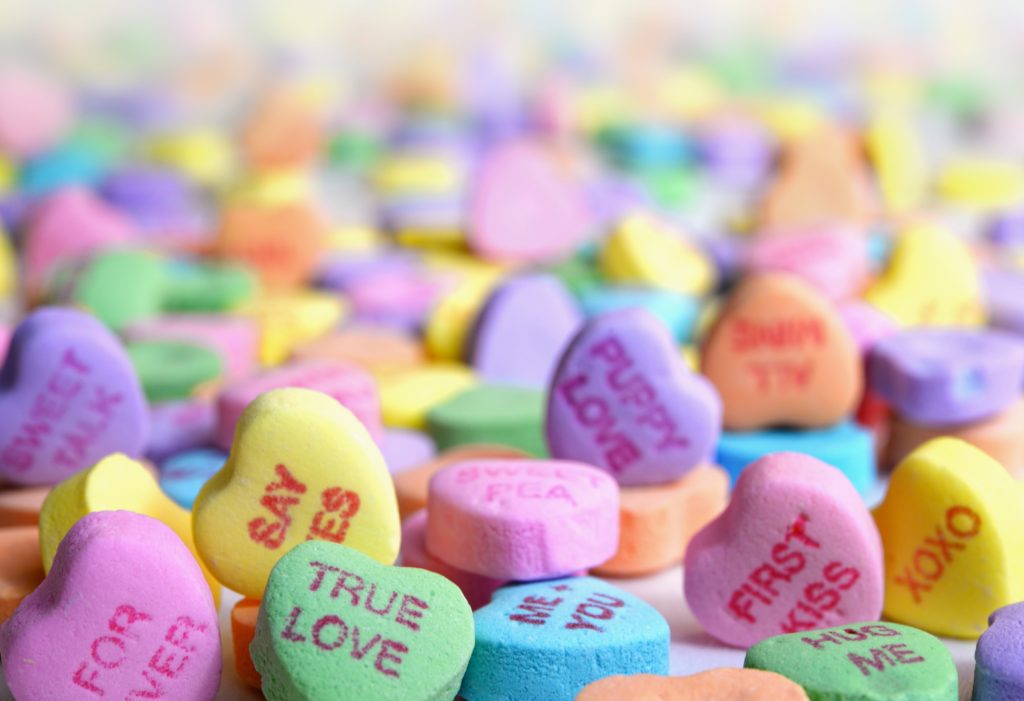 symbol of old-school dating: candy with messages on it