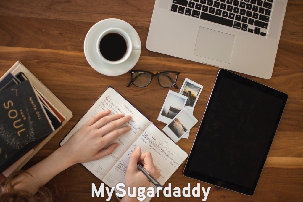 woman journaling at her desk