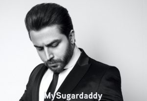 sugar daddy thinking about whether to pay sugar baby for the first date