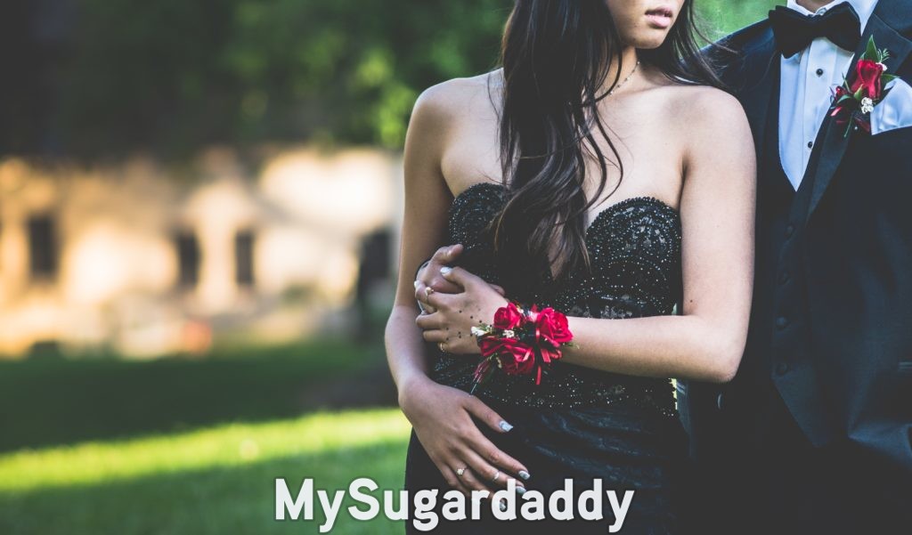 arm candy sugar baby with sugar daddy dressed for party